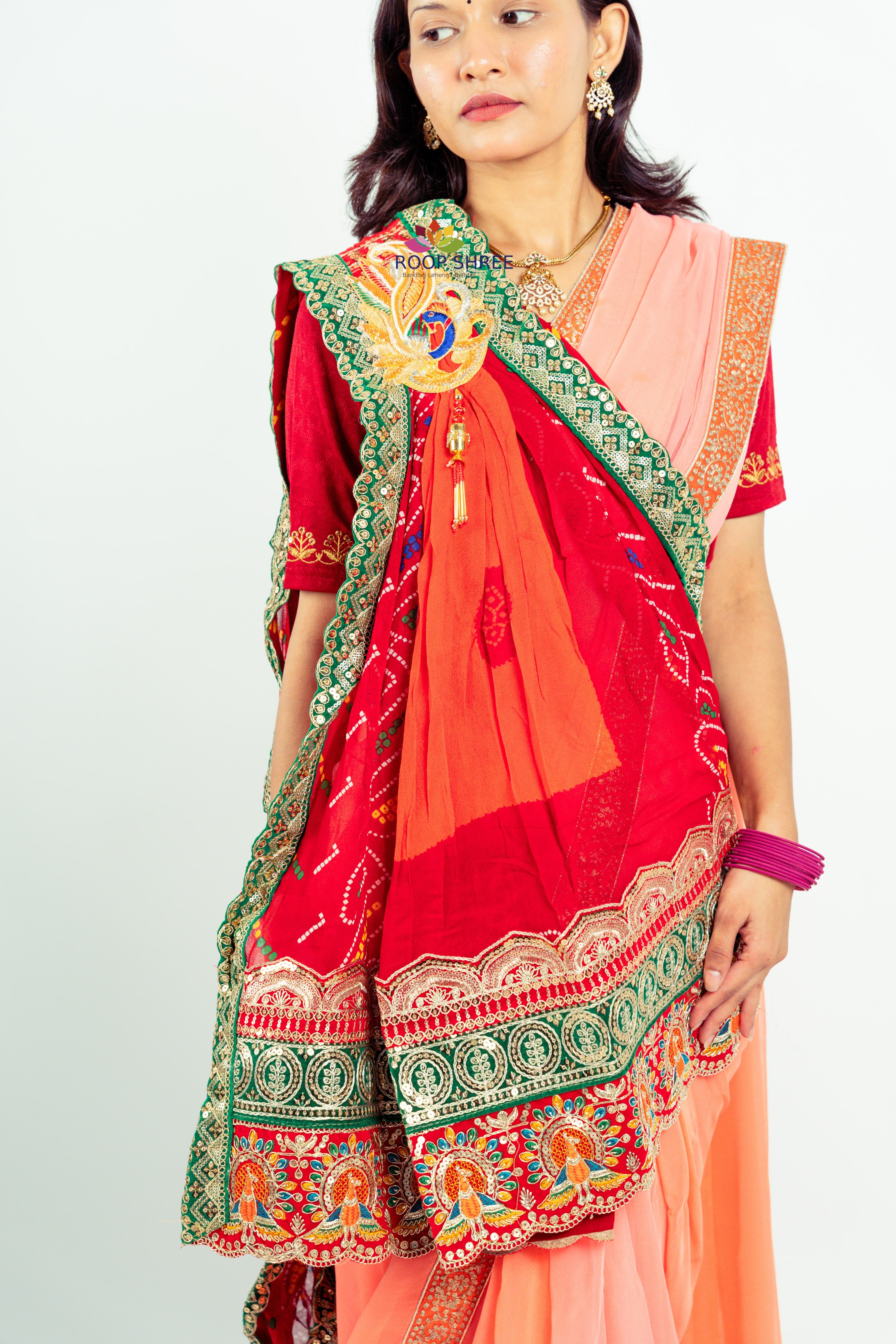 One side adorned with Peacock buta brooch,