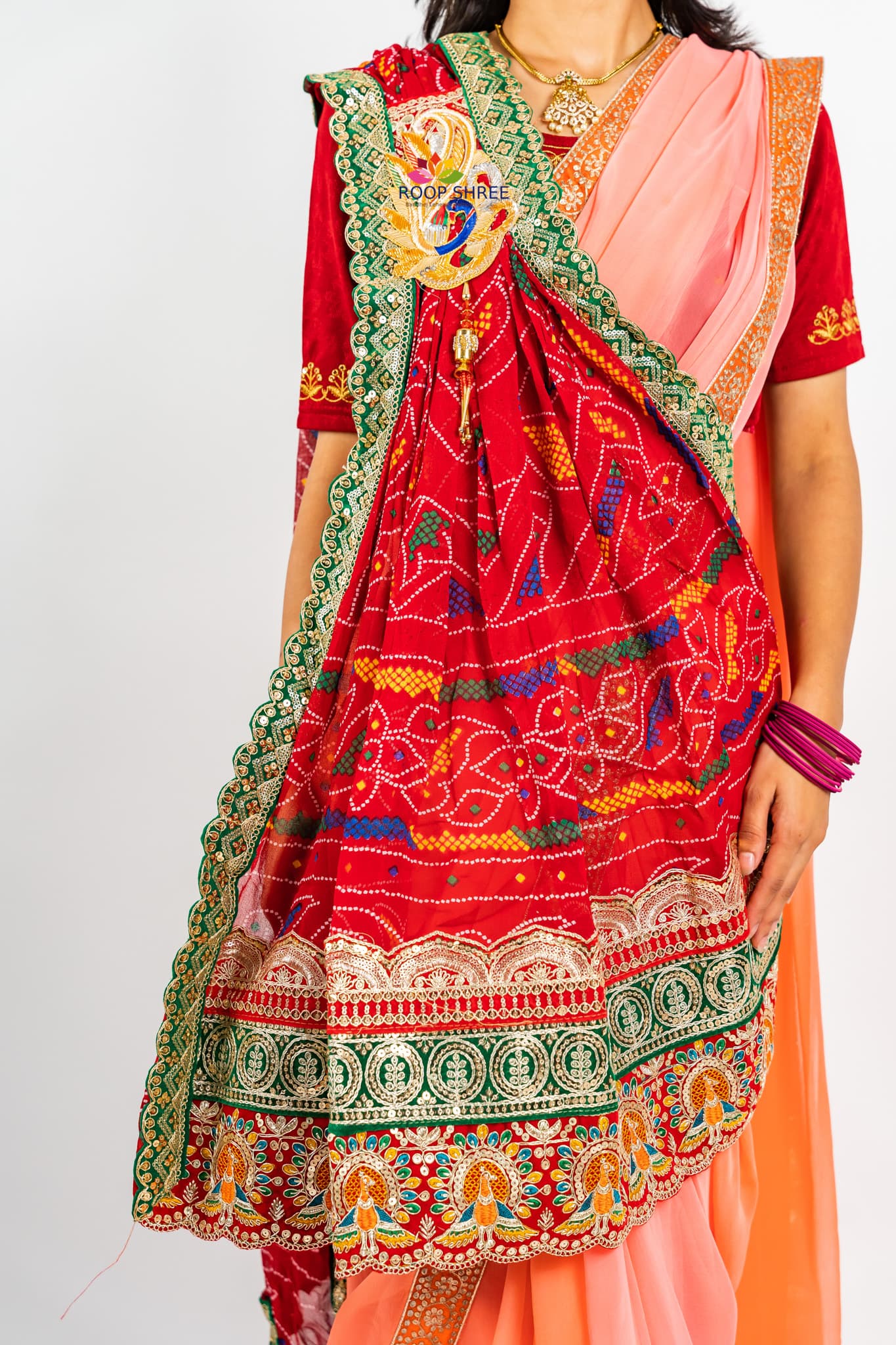 One side adorned with Peacock buta brooch,