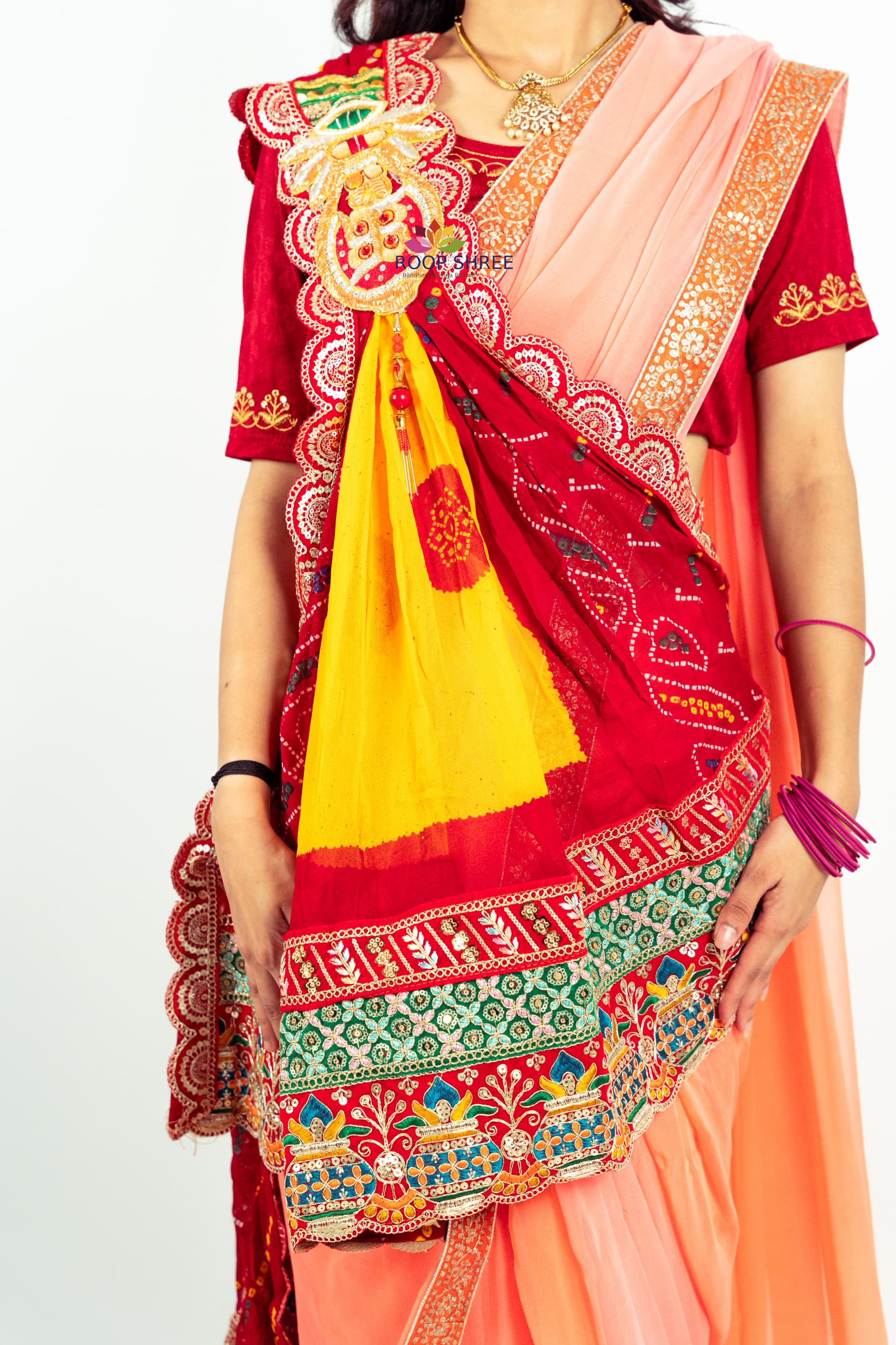 One side adorned with Kalash buta brooch