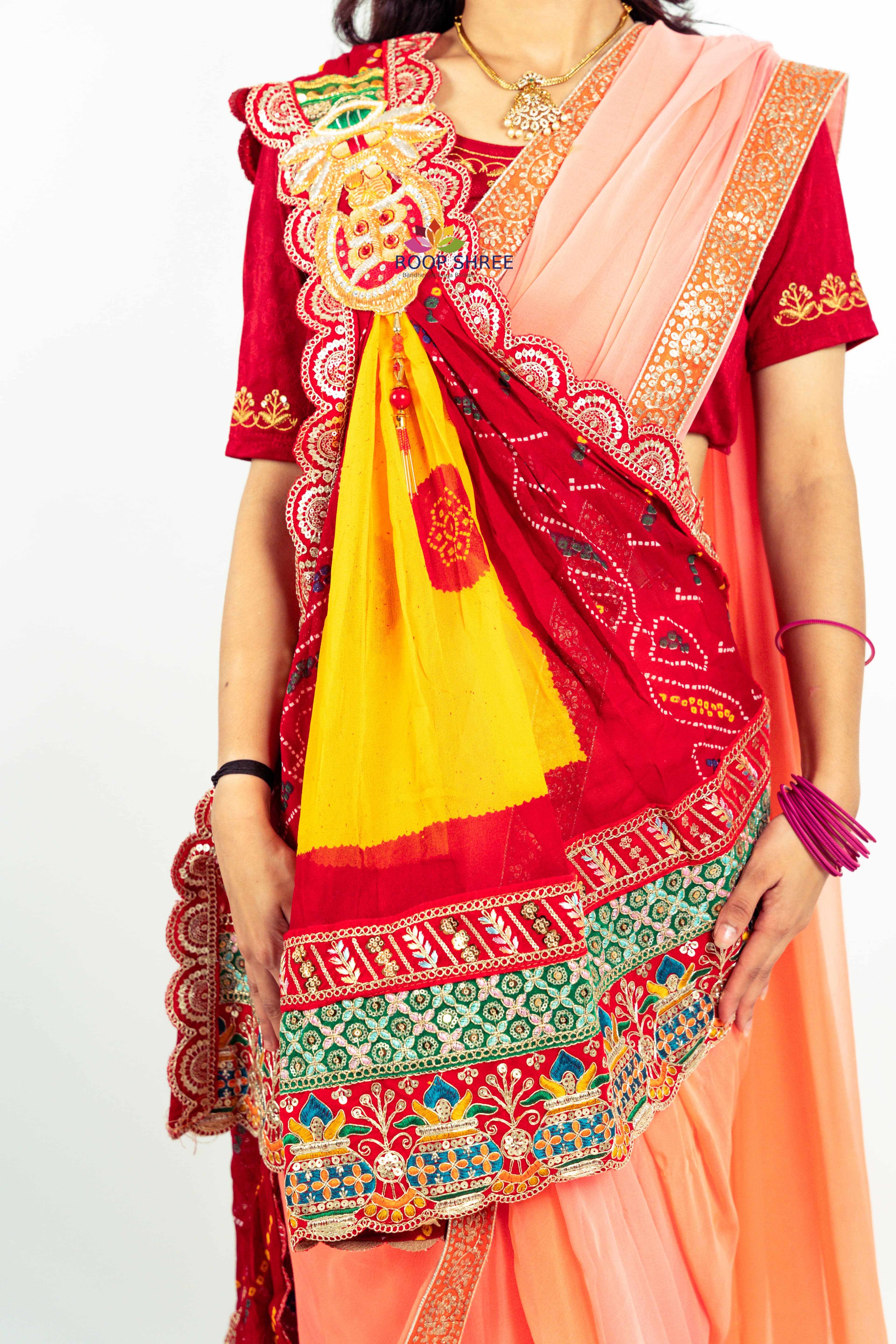 One side adorned with Kalash buta brooch