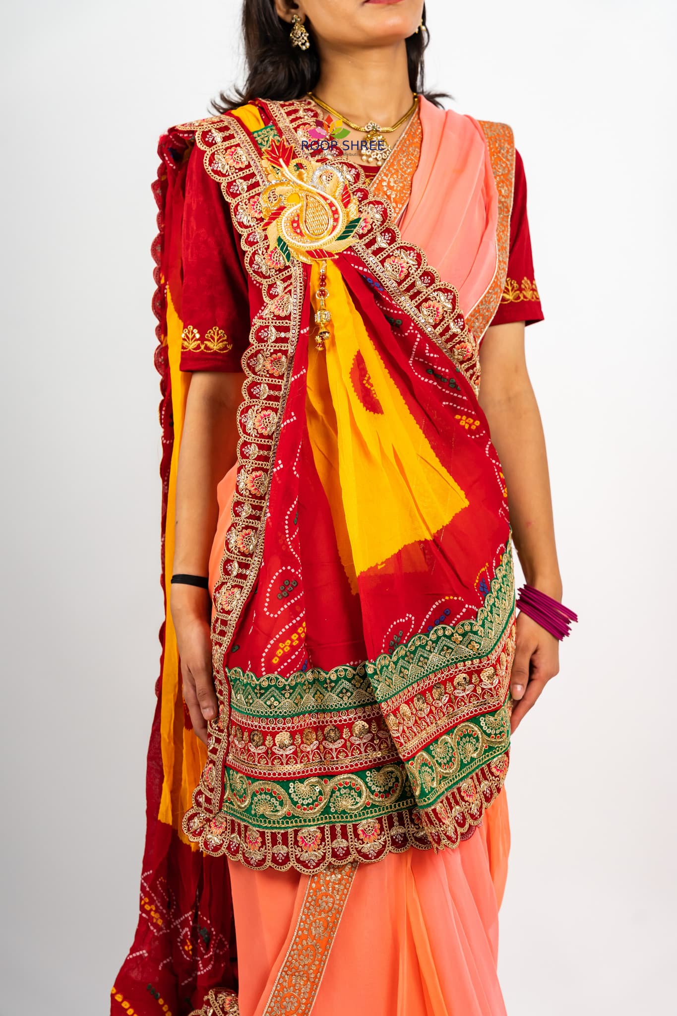 Traditional Peela Chunri Pomcha with elegant one-side brooch work.