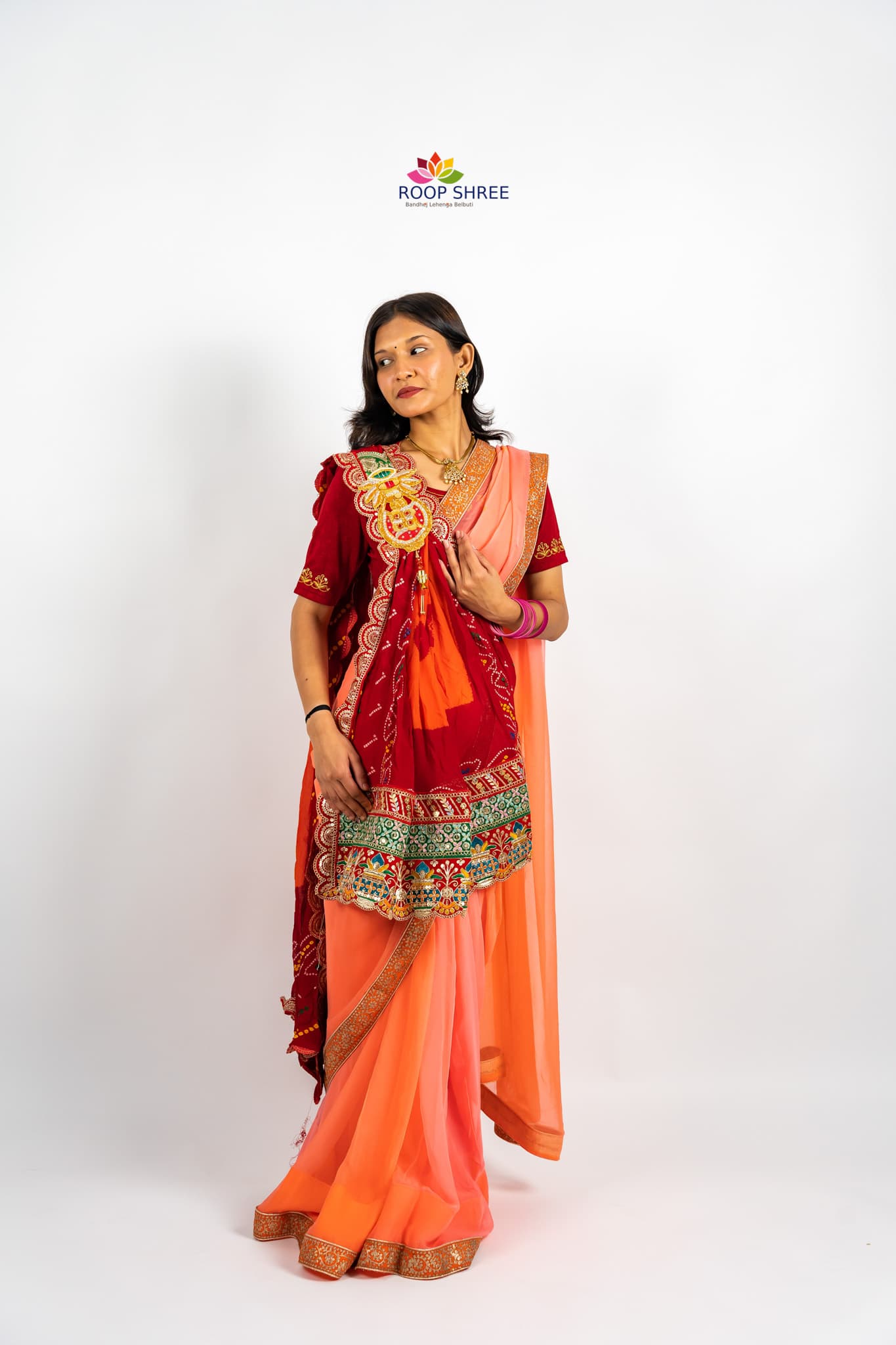 One side adorned with Kalash buta brooch
