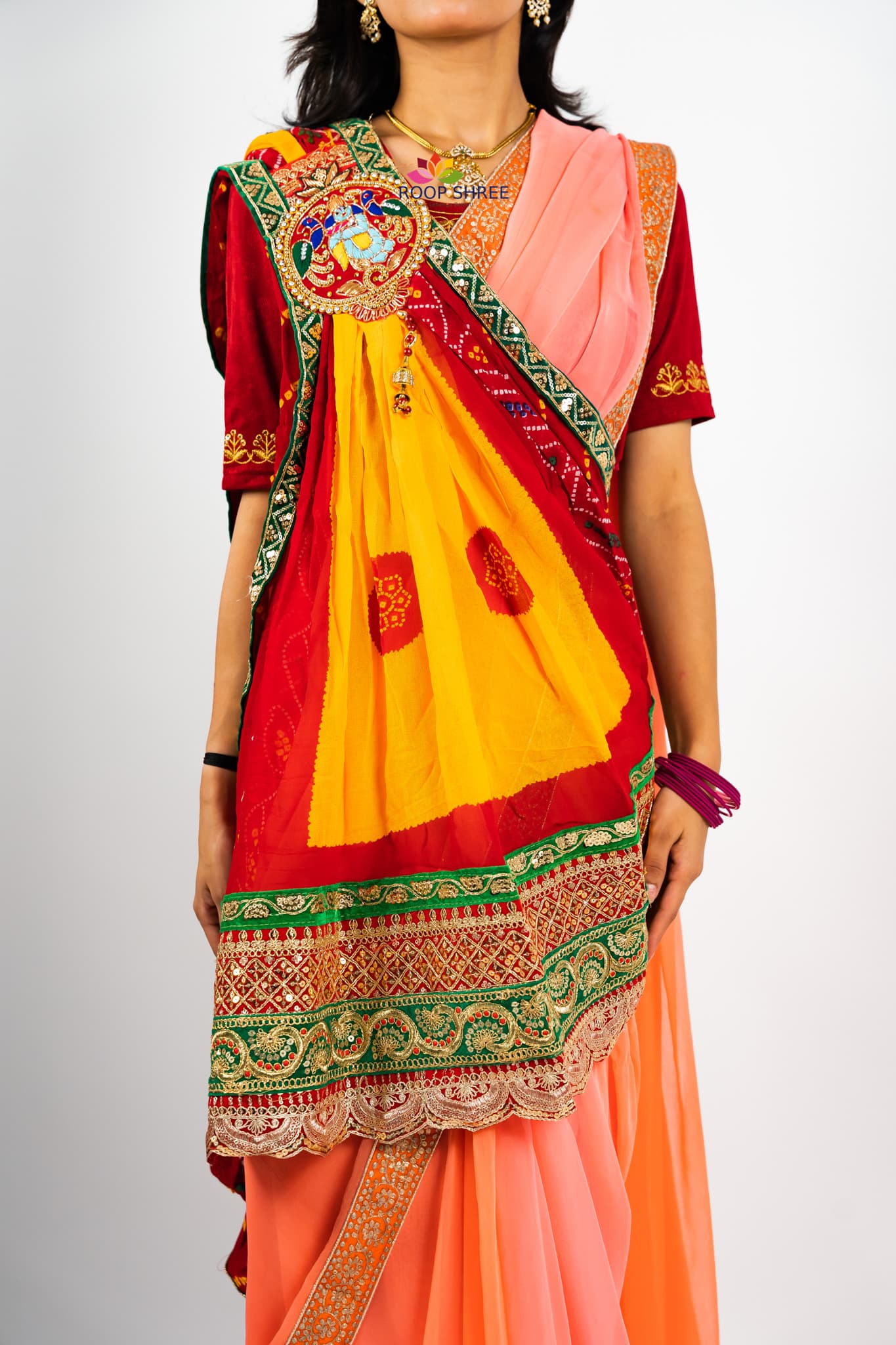 Traditional odhna adorned with Krishna brooch